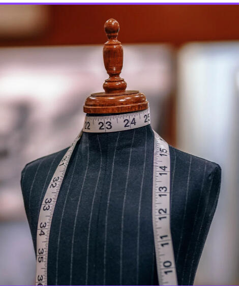 the-iconic-image-bespoke-shopping-dress-form.jpg Dress form with a measuring tape representing the Bespoke In-Home Shopping experience.