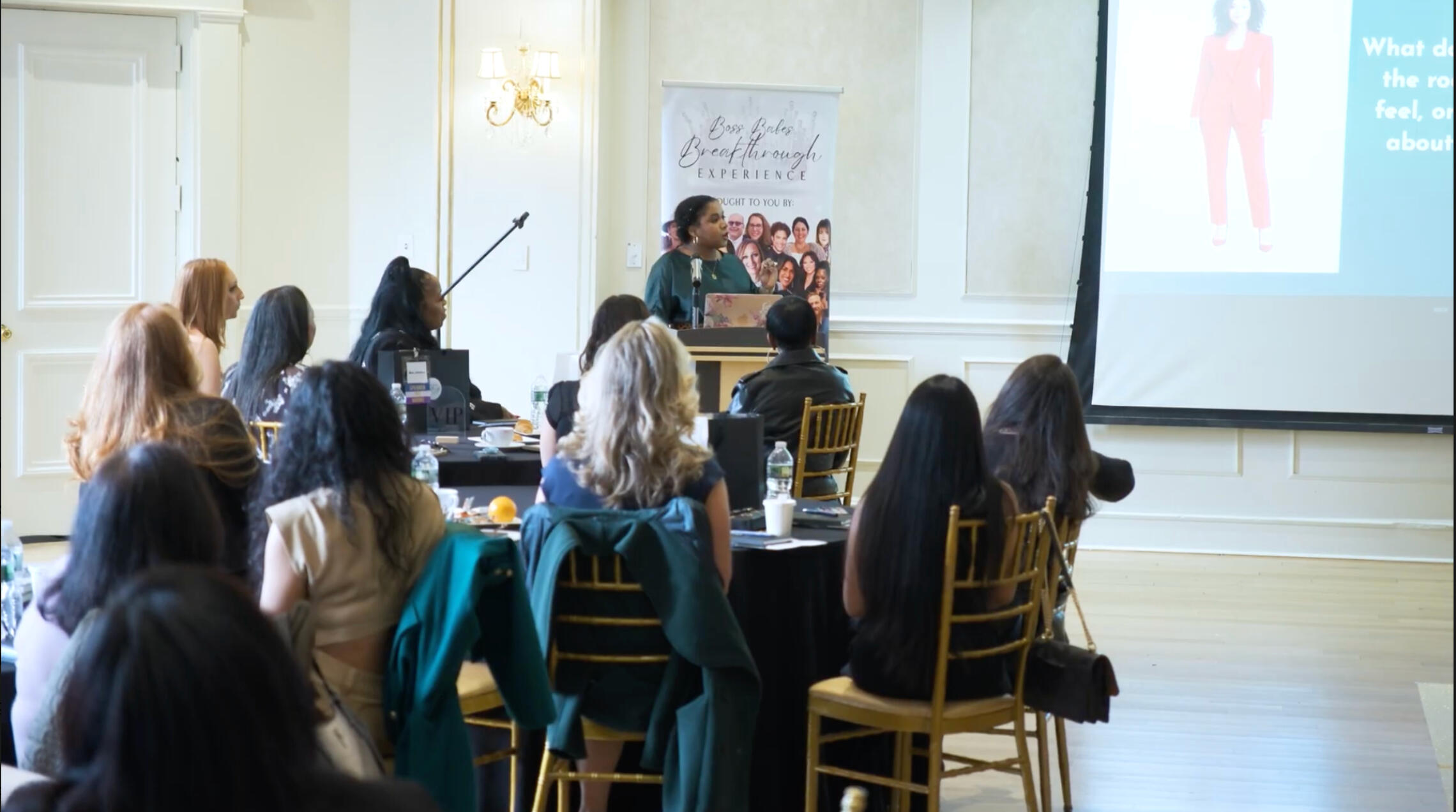 Bria Johnson presenting an I.C.O.N.I.C With Style workshop on identity, image, and influence to an audience of professional women.